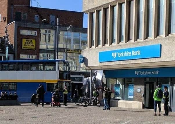 The bus crashed into the Yorkshire Bank in St John's Square. Picture by David Hanson