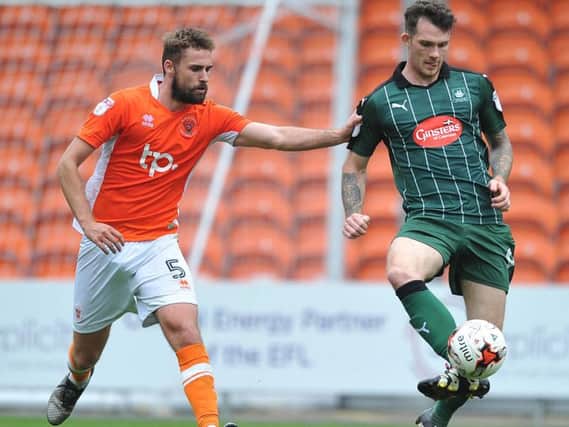 Clark Robertson in action against Plymouth earlier this season