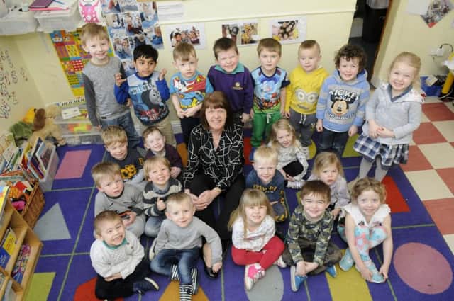 Adrienna Taylor with youngsters at Summerfield Nursery