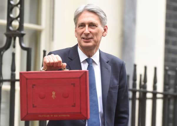 Chancellor Philip Hammond departs 11 Downing Street, London, as he heads to the Palace of Westminster to deliver the Budget statement. PRESS ASSOCIATION Photo. Picture date: Wednesday March 8, 2017. Mr Hammond is expected to deliver an upbeat assessment of Britain's economic prospects after Brexit in his first Budget as Chancellor, despite admitting that more austerity is in the pipeline as he battles to get the deficit down. See PA story BUDGET Main. Photo credit should read: Lauren Hurley/PA Wire