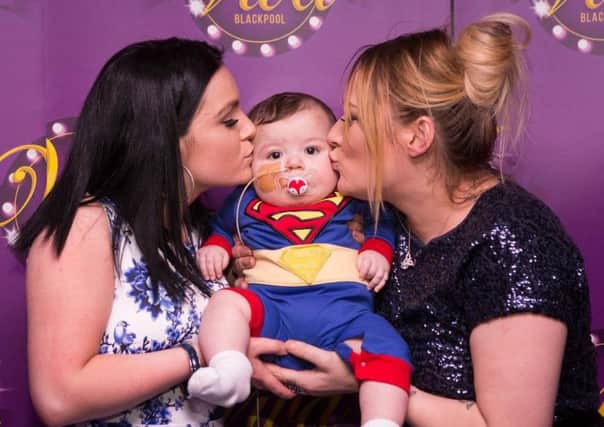 Kerrylee Glass and baby Thomas at the charity event at Viva. Picture by Somerside Photography Ltd.