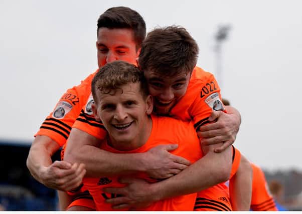 Two-goal Danny Rowe celebrates