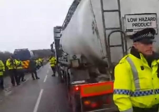 The lorry was forced to stop and block a lane of Preston New Road while the protester waved his placard from the top of the lorry.