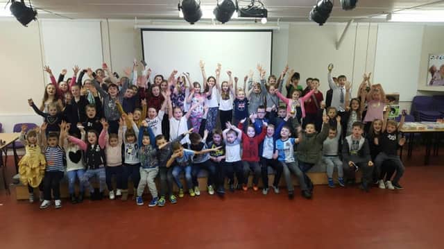 Yooung members of the Streetwise youth club celebrate a move to a new home in Warton