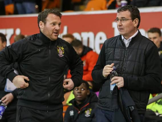 Darren Sarll shares a word with Pool boss Gary Bowyer