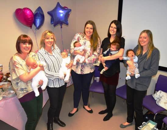 Midwife Lucy Atkins with Percy; midwife Sarah Banks with Ellie; healthcare assistant Kirsty Barcock with Ella, midwife Jenny Fogg with Oscar and Cathryn Parkinson with William
