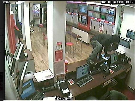 CCTV footage from the Ladbrokes raid in Whitegate Drive