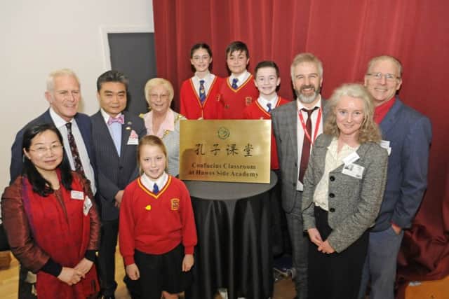 Hawes Side Academy opens it's new Confucius classroom to teach children Mandarin