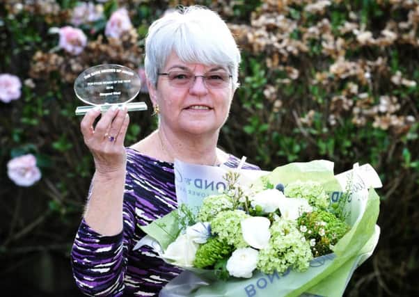 Margaret West with her trophy as Fylde Woman of the Year