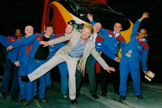 Richard Branson with Virgin staff 20 years ago