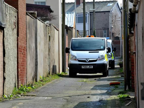 Police at the scene of the incident, at the rear of Redcar Road