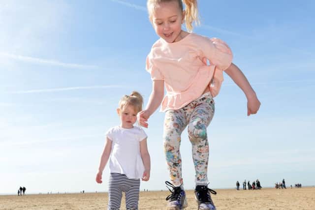 Poppy Turner  6yrs and sister Dasy 2 yrs from Manchester , Play on St Annes Beach Lancs