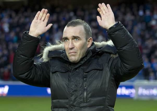 An emotional Fernando Ricksen is paraded to the Rangers fans at half time during the Scottish League One match at Ibrox Stadium, Glasgow. Picture date: Saturday January 11, 2014. See PA Story SOCCER Rangers. Credit:  PA Wire.