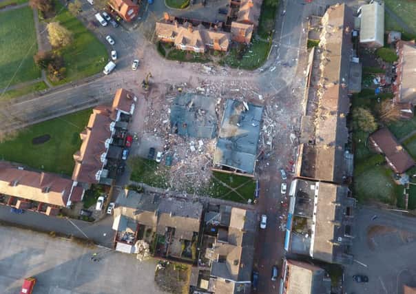 Aerial over the the devastated buildings destroyed by a an explosion in Bebington, Wirral
