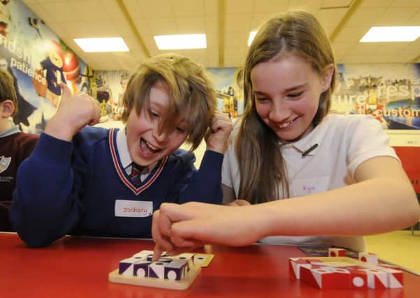 Schools maths puzzle afternoon at Kincraig Primary.  Pictured is 10-year-old Zachary Rossall from Westcliff Primary with 11-year-old Kya Cropper from Kincraig Primary.