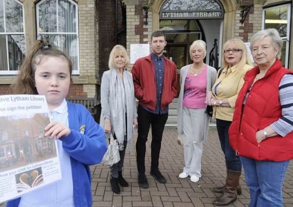 Nine-year-old Cara Restrick with a petition against the closure of Lytham Library in 2016 watched by with fellow supporters Anne McGettigan, Adam Freeland, Kate Patten, Liz Reddy and Maureen Wilson.