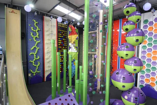 The new Clip 'n Climb attraction with the huge slide far left