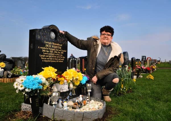 Julie McCarthy at her fathers grave