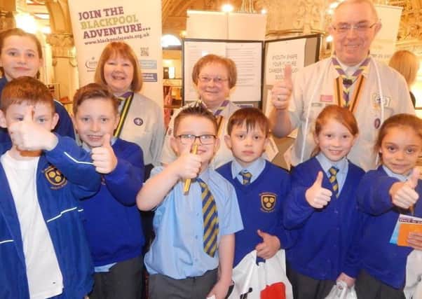 Children from St Nicholas's church of England Primary School, Blackpool with members of Support Adult Services Unit during the Scouts recruitment event