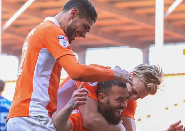 Blackpools players celebrate Kyle Vassells winning goal against Hartlepool United