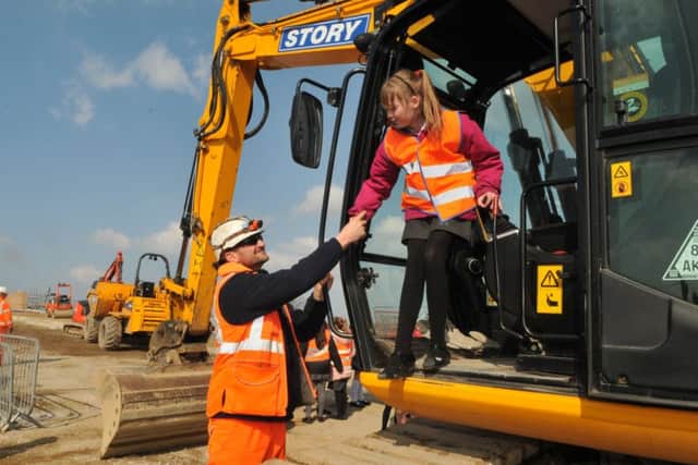 Pupils from Bispham Endowed had a site visit to Crossley's Bridge to talk to contractors in March. Pictured here is Kacey Graham with Jay MacDonald.