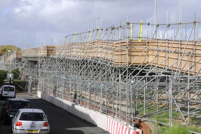 A temporary footbridge was put up last year to help pedestrians and cyclists get across the bridge
