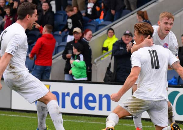 Dan Bradley celebrates scoring for AFC Fylde along with Andy Bond and Matty Hughes   Picture: Steve McLellan