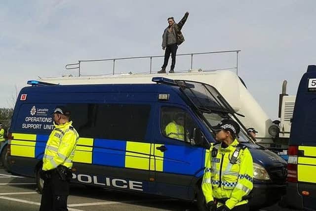 A photograph of a fracking protester on top of a Cuadrilla supply tanker at Preston New Road  taken on April 3 by Ami Roberts.