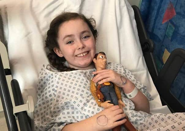Summer Wrigley, eight, has had surgery to remove two tumours from her brain