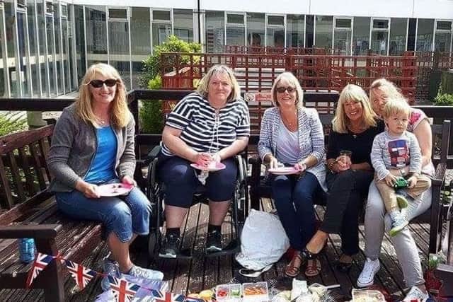 Haidee Wilson enjoying a picnic with friends in Royal Preston Hospital's garden while rehabilitating. From left to rihgt: Shelagh Parkinson, Haidee Wilson, Suzanne Steedman, Libby Gomm, Julia and William Mellor