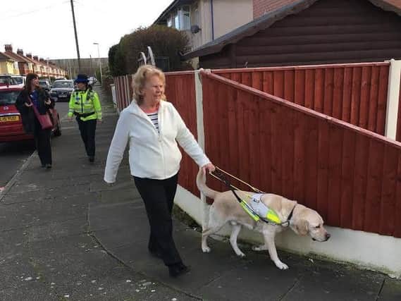 Carole Holmes and her guide dog Inca on their walk round South Shore to demonstrate the obstacles faced
