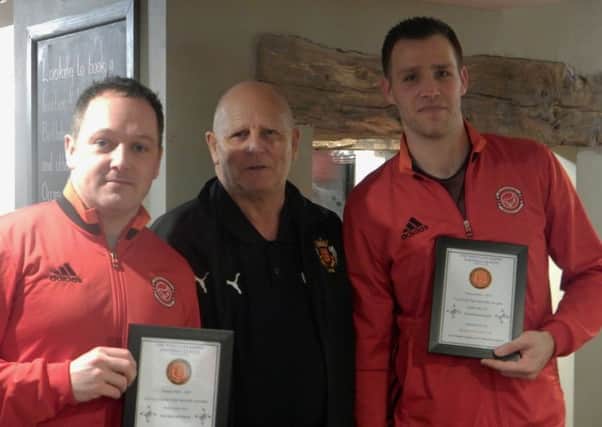Wrens' manager Matt King (left) and first team captain Chris Morris (right) receiving awards for West Lancashire League Premier Division manager and team of the month awards for February 2017