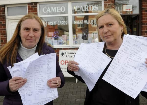 Sisters Tracey Strangwick and Jackie Bell from Cameo Cards with their petition asking for compensation from construction firm Lovells