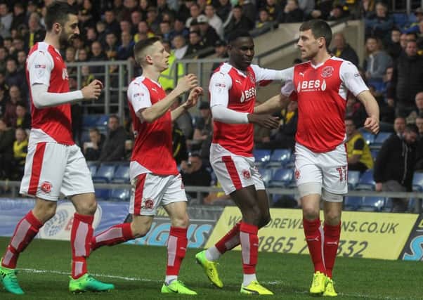 Fleetwood Town's Bobby Grant celebrates scoring the first goal at Oxford
