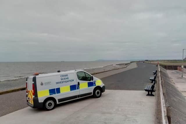 Police at Rossall Beach where a man's body was found this morning