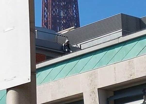 Two children were reportedly spotted on the roof of Debenhams in Blackpool.