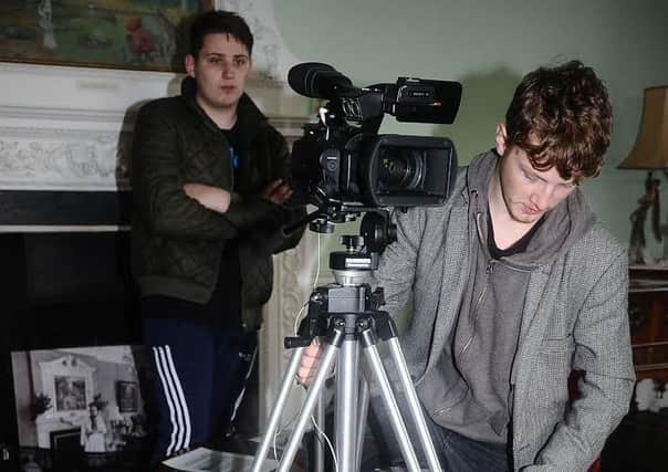Kyle Dickinson, 16, and Adam Morgan, 17,both of Blackpool, have helped film a paranormal documentary at Lytham Hall