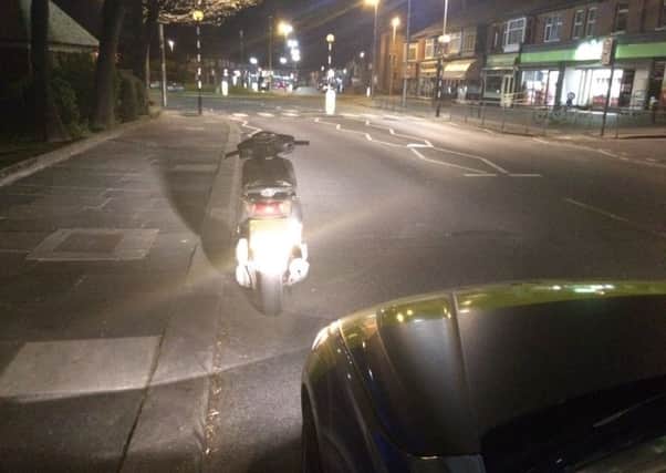 A 23-year-old man from Blackpool was arrested after this silver Honda moped was pulled over in Layton