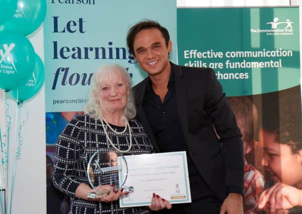 Ann Shellard, an early years language consultant from Blackpool has been awarded the Communication Champion 2017 Award 
Pictured here with singer Gareth Gates at the ceremony 
Pic: Richard Tatham