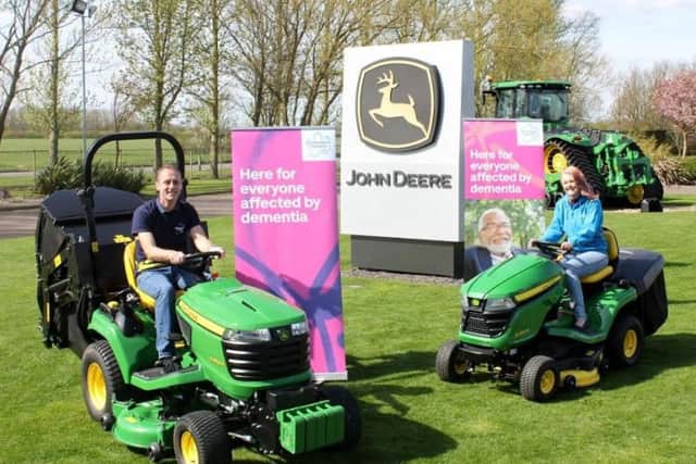 Andy and Kathryn Maxfield, from Inskip, are planning to break the Guinness World Record for driving from John OGroats to Lands End on a lawn tractor, while also raising money for Alzheimers Society.