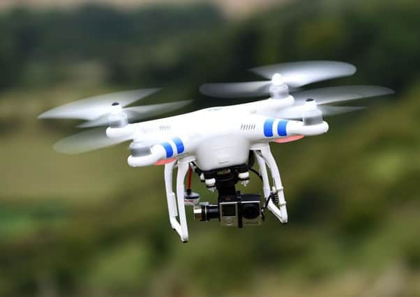 A drone in flight, as a specialist unit will spearhead efforts to stop drones dropping drugs and mobile phones into prisons.Picture by Andrew Matthews/PA Wire