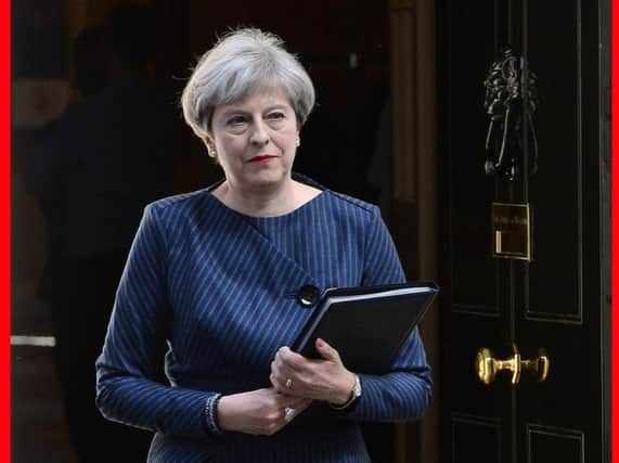 Prime Minister Theresa May prepares to make a statement in Downing Street, London, where she announced a snap general election on June 8