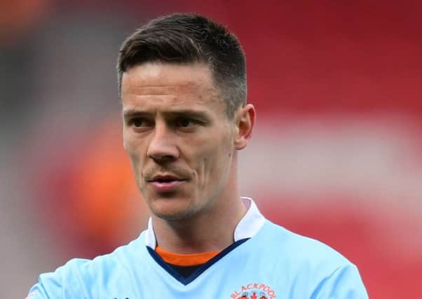 Blackpool midfielder Ian Black wants Bloomfield Road to become a fortress