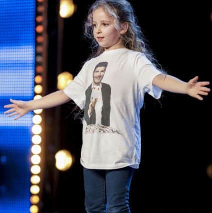 Embargoed to 2120 Saturday April 22

MANDATORY CREDIT REQUIRED: SYCO/THAMES 

ITV undated handout photo of Issy Simpson during the audition stage for ITV1's talent show, Britain's Got Talent. PRESS ASSOCIATION Photo. Issue date: Saturday April 22, 2017. See PA story SHOWBIZ BGT. Photo credit should read: Tom Dymond/Syco/Thames/PA Wire

NOTE TO EDITORS: This handout photo may only be used in for editorial reporting purposes for the contemporaneous illustration of events, things or the people in the image or facts mentioned in the caption. Reuse of the picture may require further permission from the copyright holder.