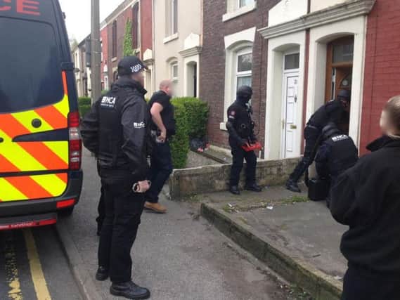 Police raided properties across Lancashire