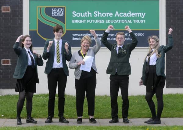 South Shore Academy are celebrating being out of special measures by Ofsted.  Pictured is headteacher Jane Bailey with Laura Caygill, Josh Heap, Kye Wylie and Valerija Ravinska