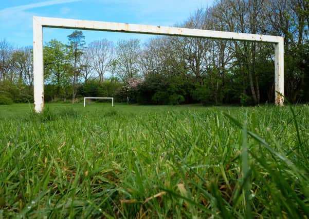 Long grass around Blackpool. Bispham Rock Gardens five a side football pitch.