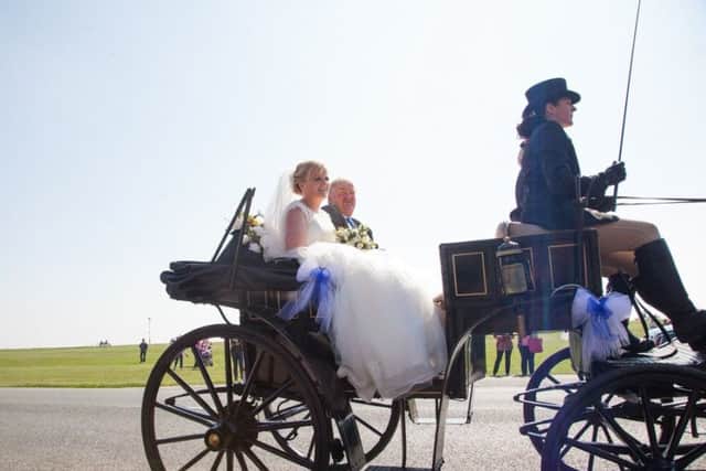 Penny Pemberton arriving at church with her dad Andrew Pemberton. Pic by Jo Boulton Photography