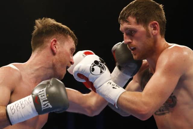 Scott Cardle on his way to a shock defeat against Robbie Barrett in Glasgow