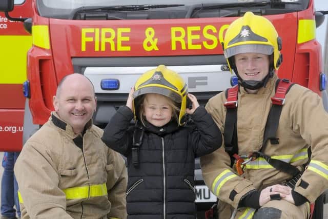 Our Blue Light emergency services event on the Comedy Carpet.  Heidi-Nicole Ashfield, aged 5, with crew manager Dan Dumigan and firefighter Russell Jackson.